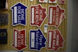 Home and arrow-shaped signs (in blue and red)